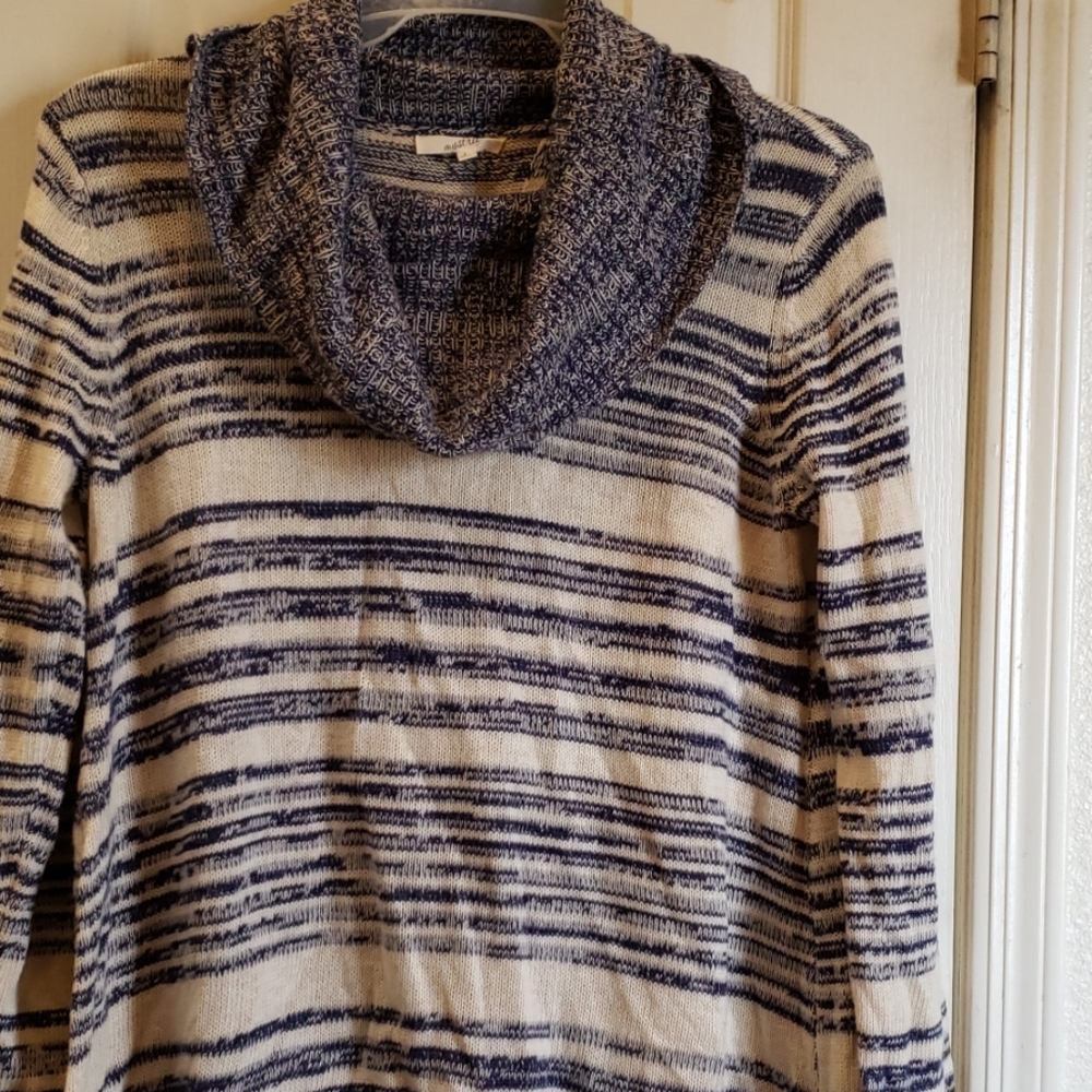 Turtleneck sweater.  Split in back